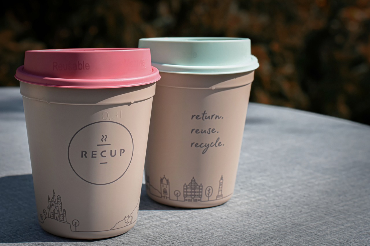 How do paper cups get made and recycled?
