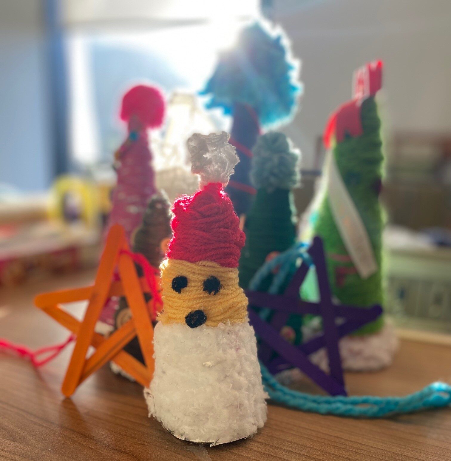 Reusing old card or magazine pages to make cones which you can customise and use for multiple Christmases is a fun and creative way to beat the waste stream and save money.